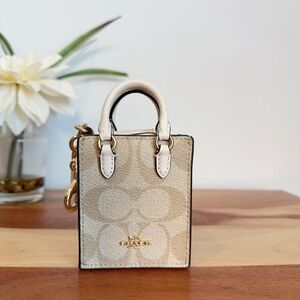 NWT Coach North/South Mini Tote Bag Charm In Signature‎ Canvas